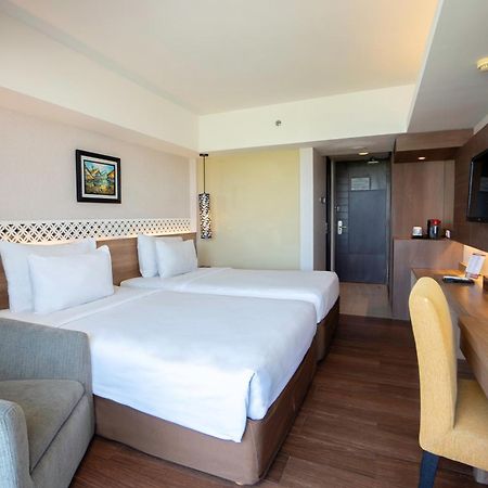 Отель Ramada By Wyndham Bali Sunset Road Kuta Семиньяк Экстерьер фото