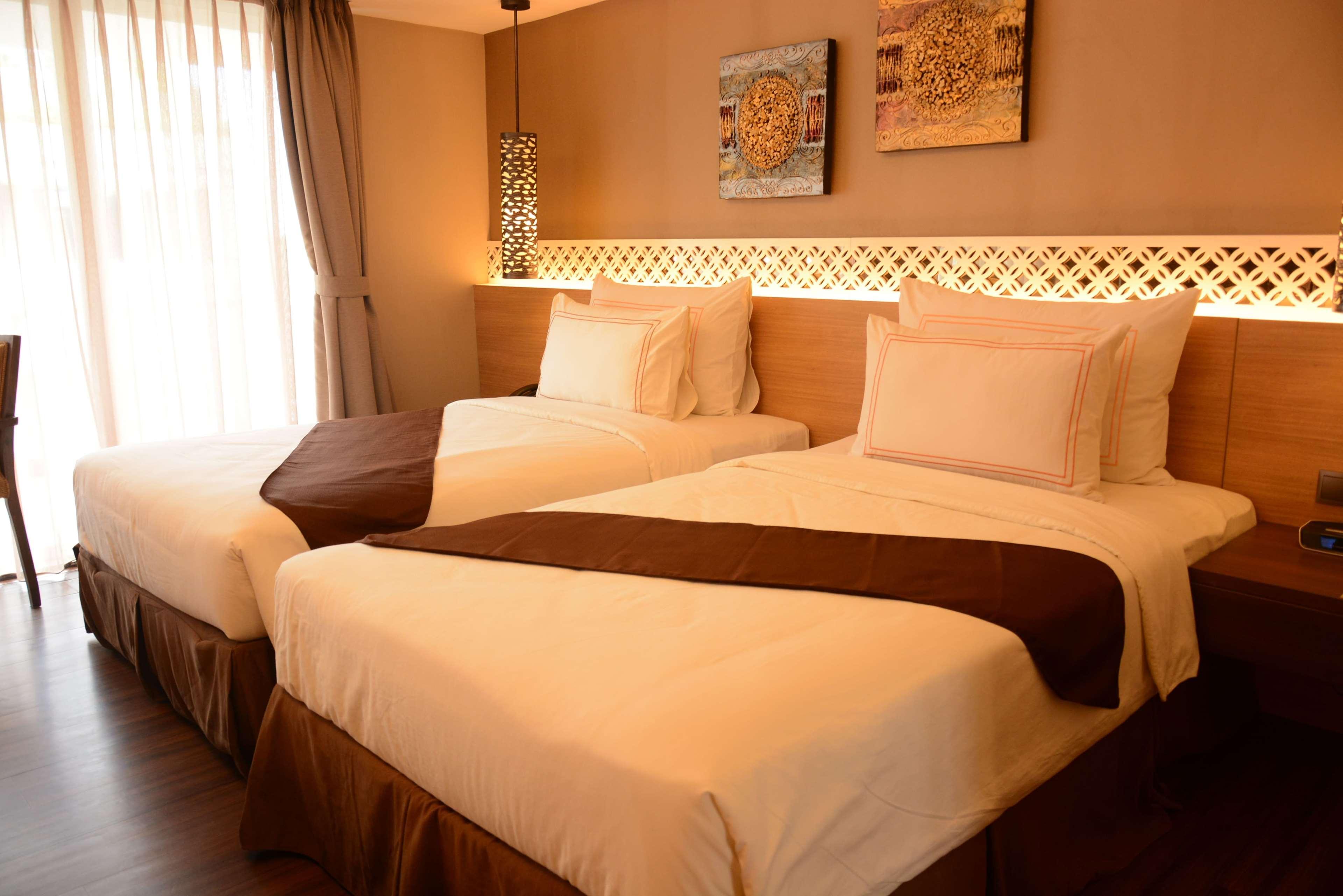 Отель Ramada By Wyndham Bali Sunset Road Kuta Семиньяк Экстерьер фото