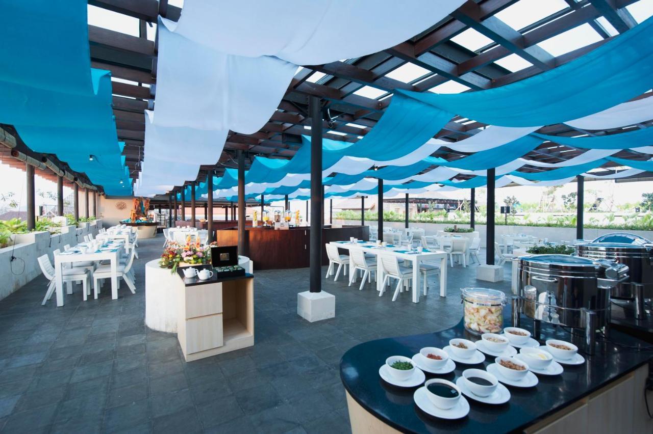 Отель Ramada By Wyndham Bali Sunset Road Kuta Семиньяк Экстерьер фото