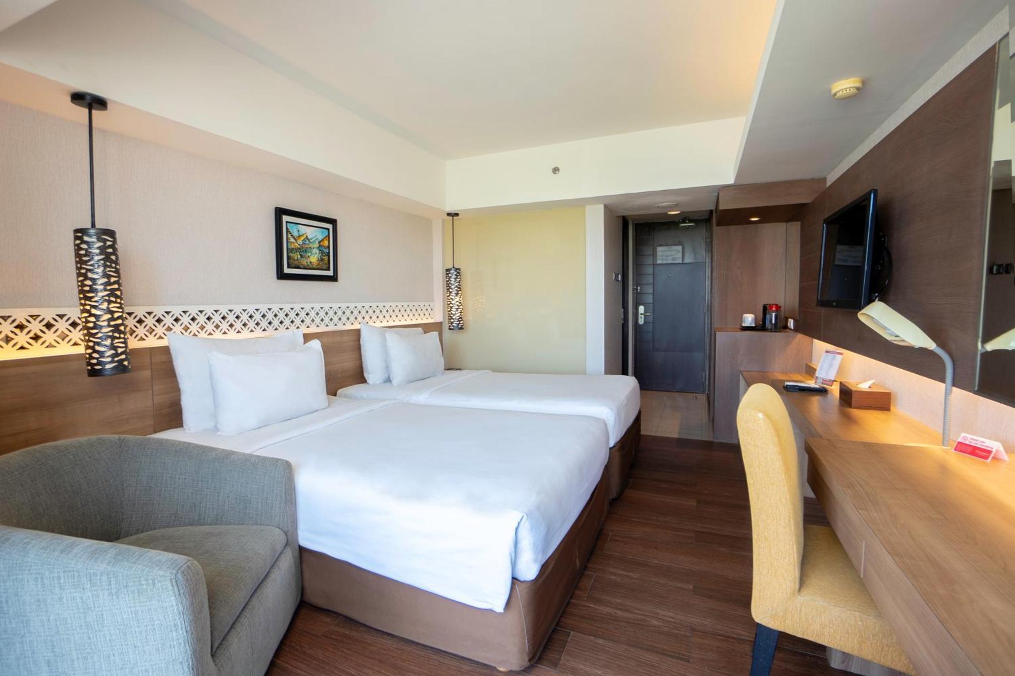 Отель Ramada By Wyndham Bali Sunset Road Kuta Семиньяк Экстерьер фото